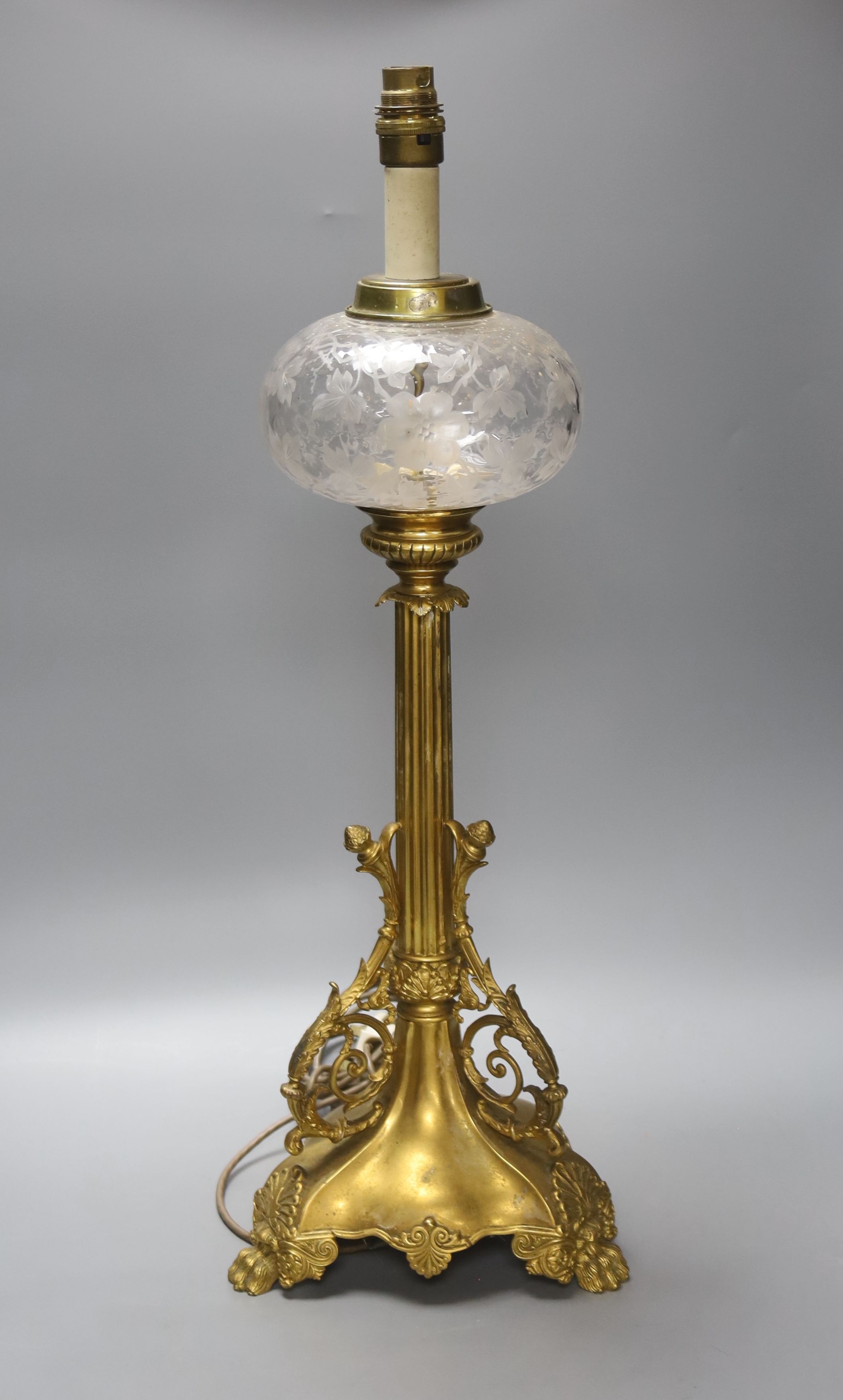 An ornate brass and glass table lamp, overall height 60cm